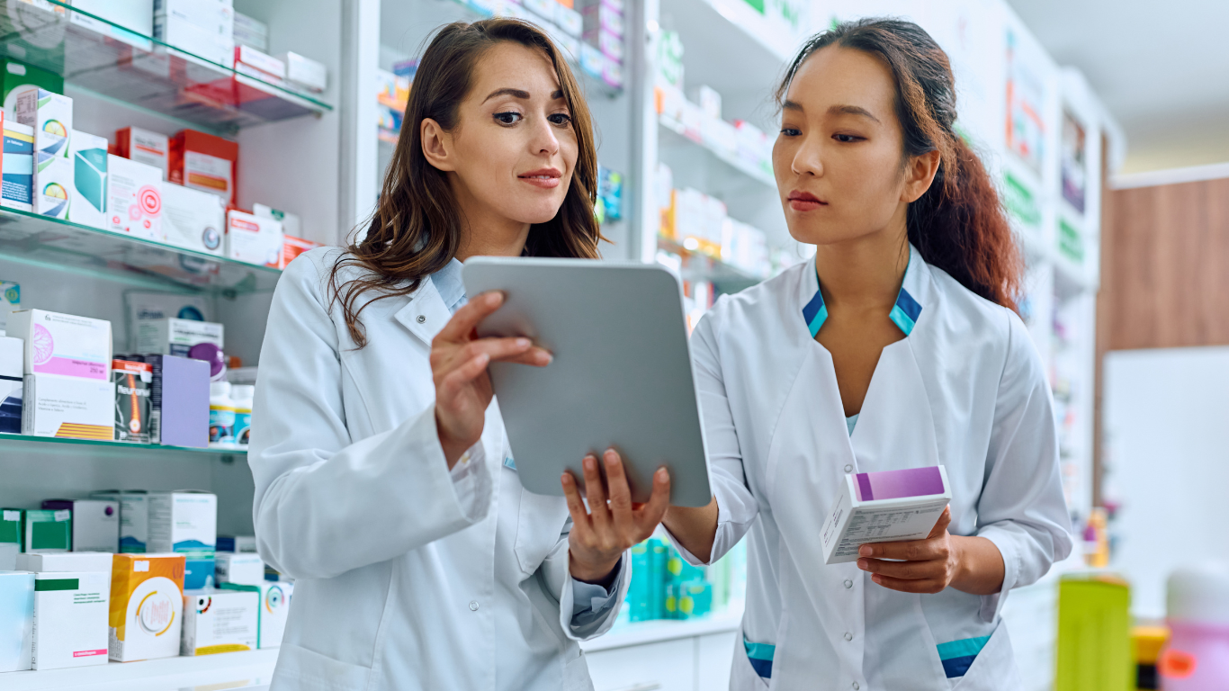 Two pharmacist working on track and trace